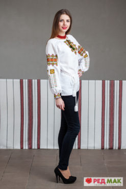 Біла сорочка з яскравою геометричною вишивкою 