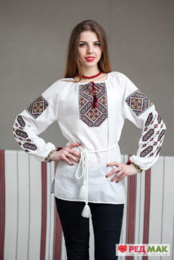 Біла сорочка з кольоровим орнаментом 